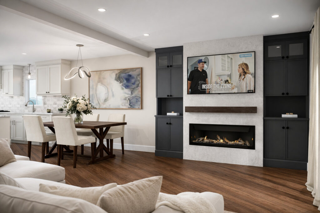 Renovated open-concept living room by Zzone Homes with a linear gas fireplace, navy built-in cabinetry and a wood mantel